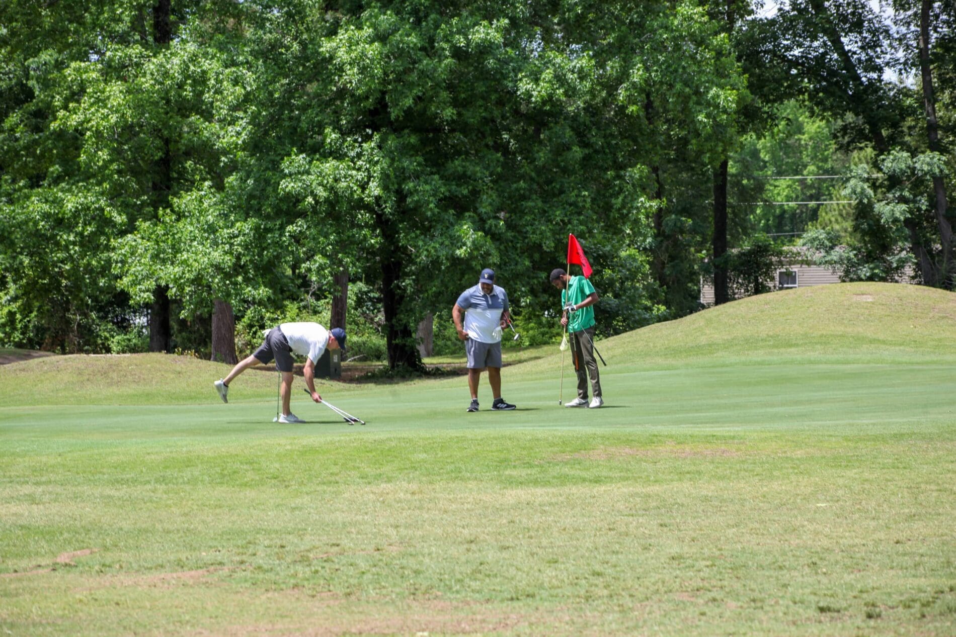 playing golf at Traces Golf Course