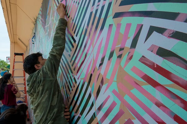 Mural being painted at Artfields